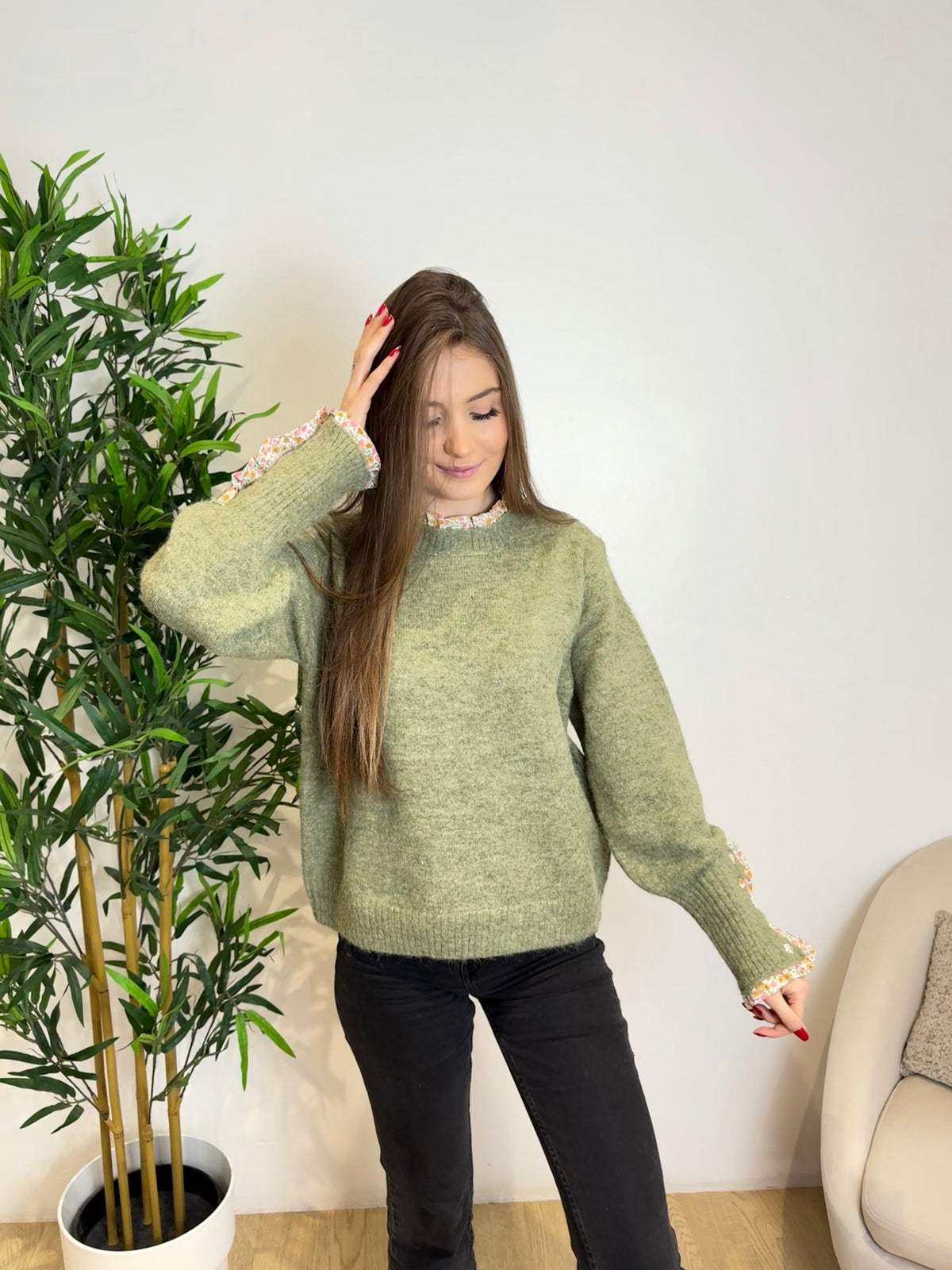 Pull avec détails au manches et au col