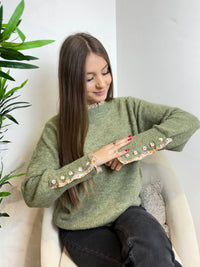 Pull avec détails au manches et au col