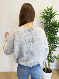 Pull avec détails noeuds