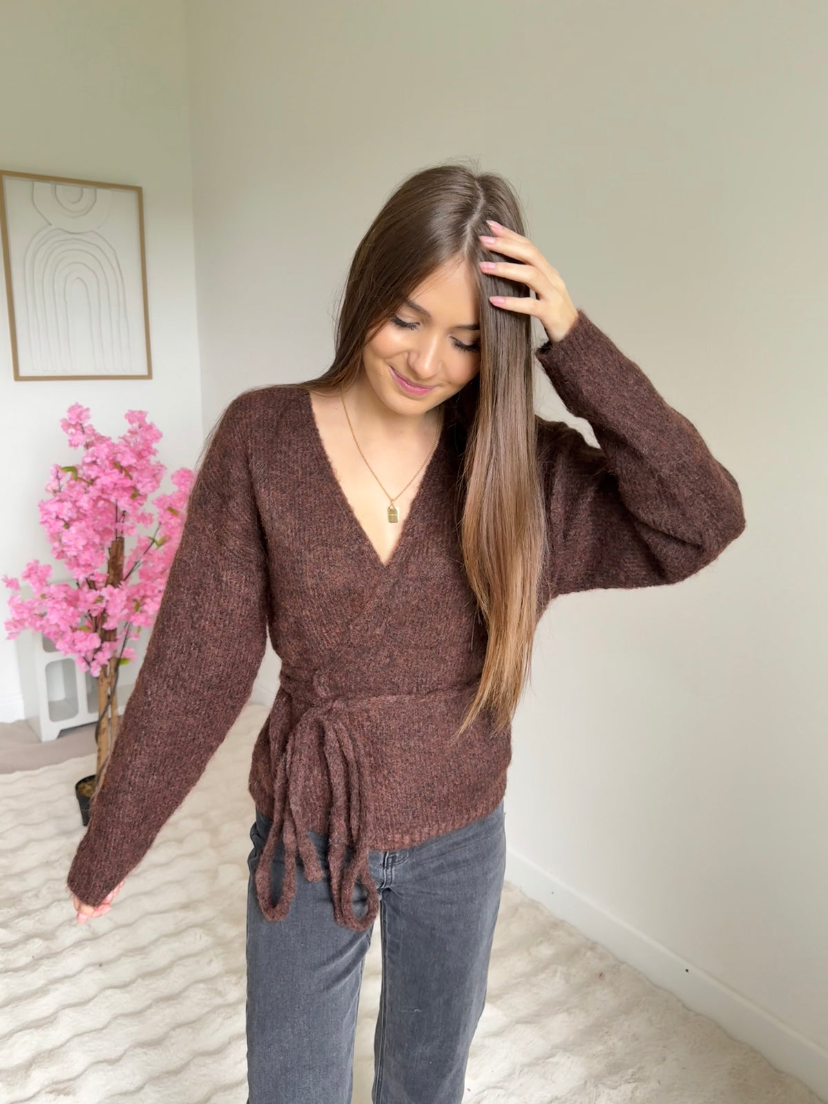 Pull cache cœur marron